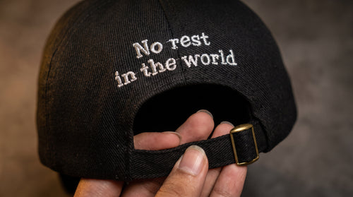 Premium Arabic Calligraphy Cap – No Rest in This World